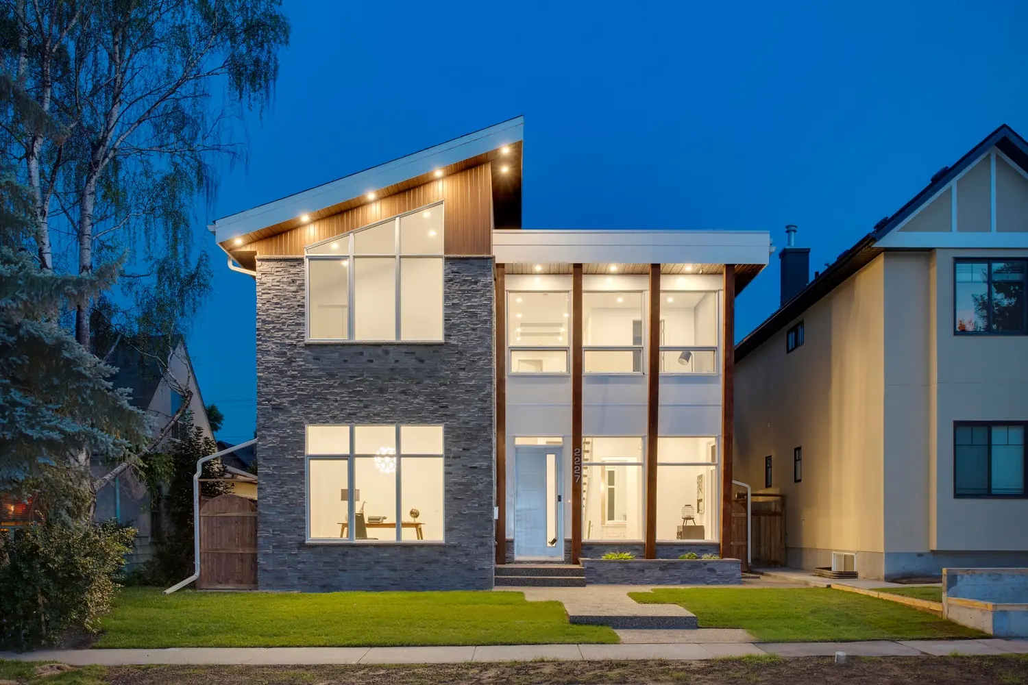Luxury exterior renovation with premium siding and finishes